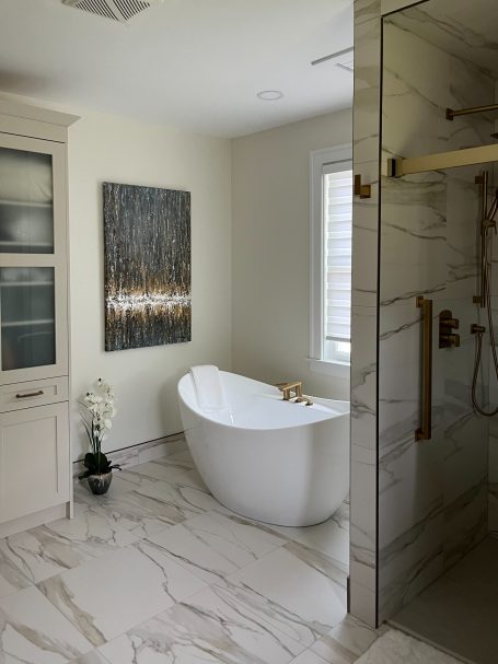 My Painting in my Clients' bathroom Modern bathroom featuring a freestanding tub, elegant decor, and natural light.